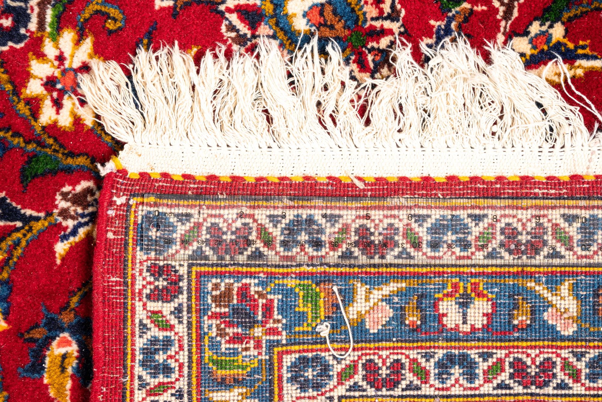 A Kashan Wool Rug