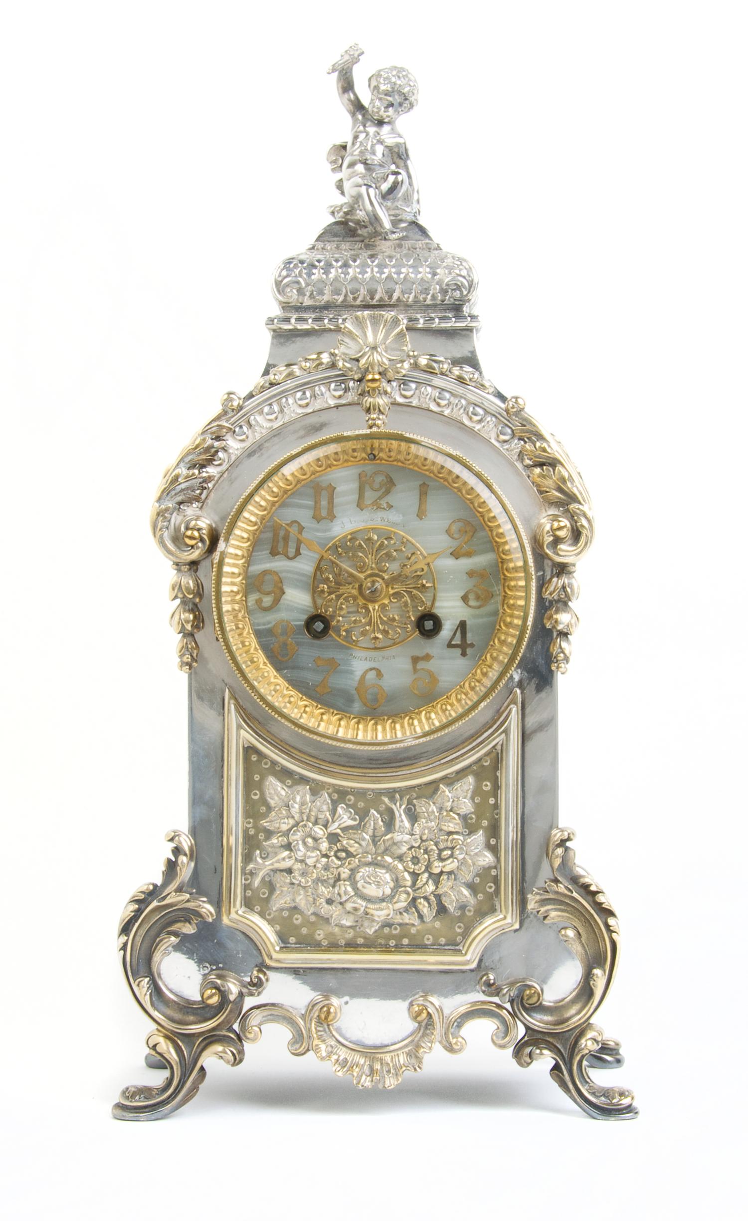 An American Silverplate Mantle Clock, Derby Silver Co., Derby, Connecticut, Height 16 1/2 inches.
