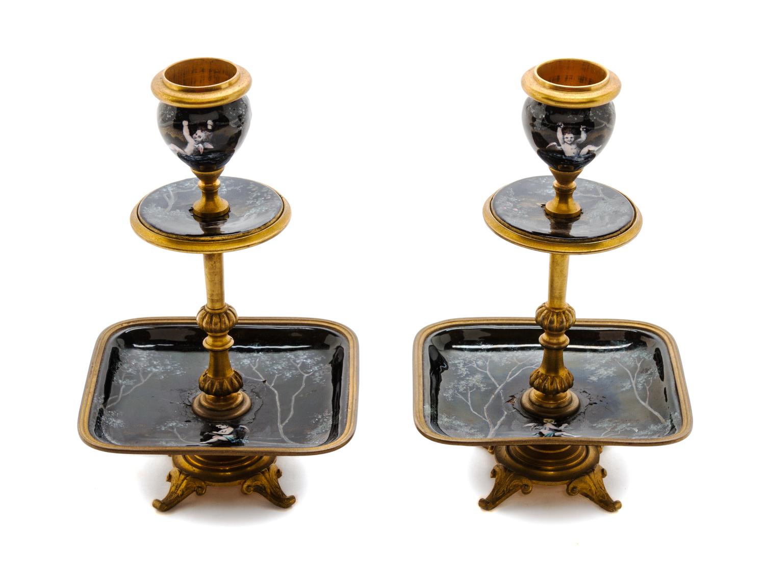A Pair of French Gilt Bronze and Enamel Candlesticks, Height 6 1/2 inches.