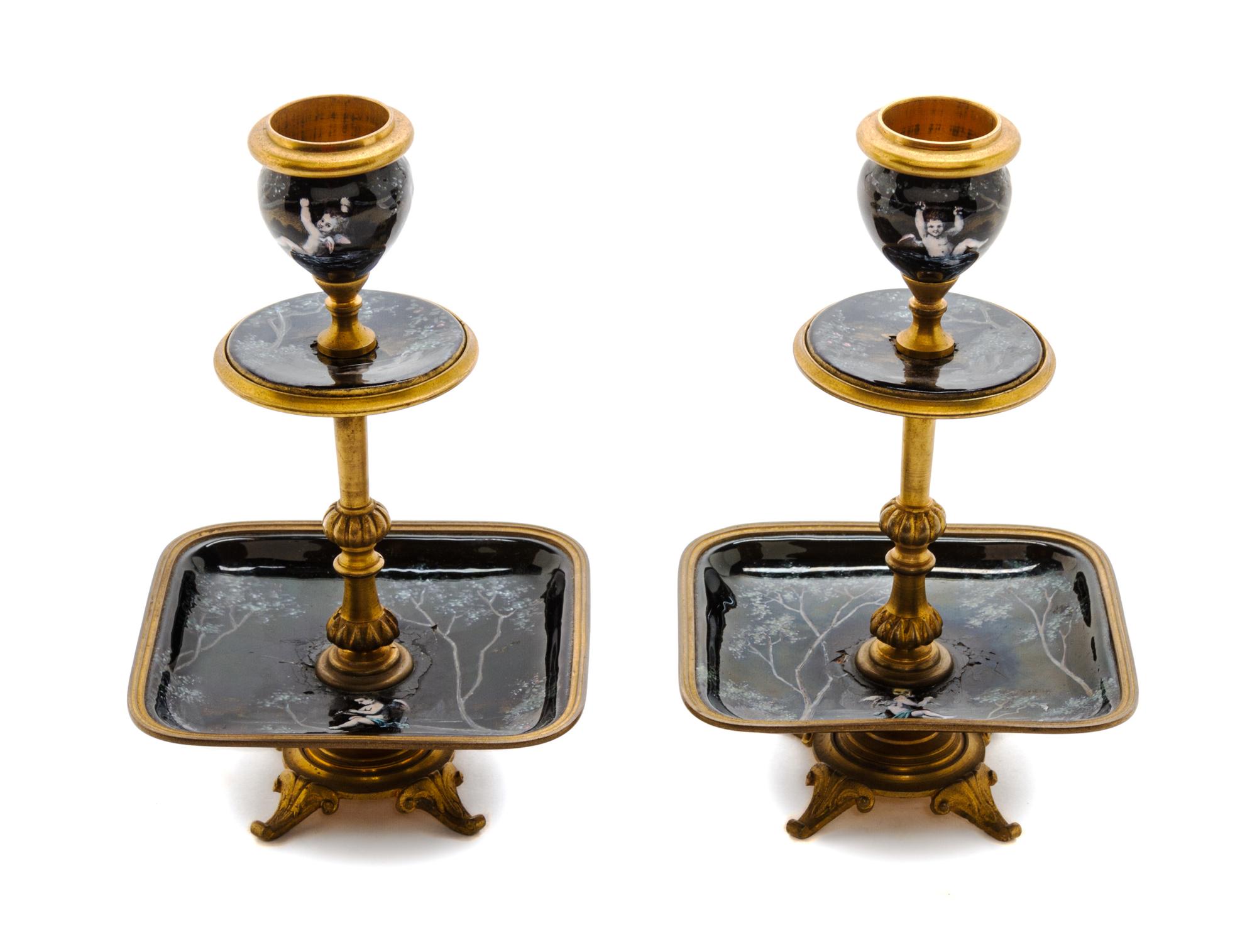 A Pair of French Gilt Bronze and Enamel Candlesticks, Height 6 1/2 inches.
