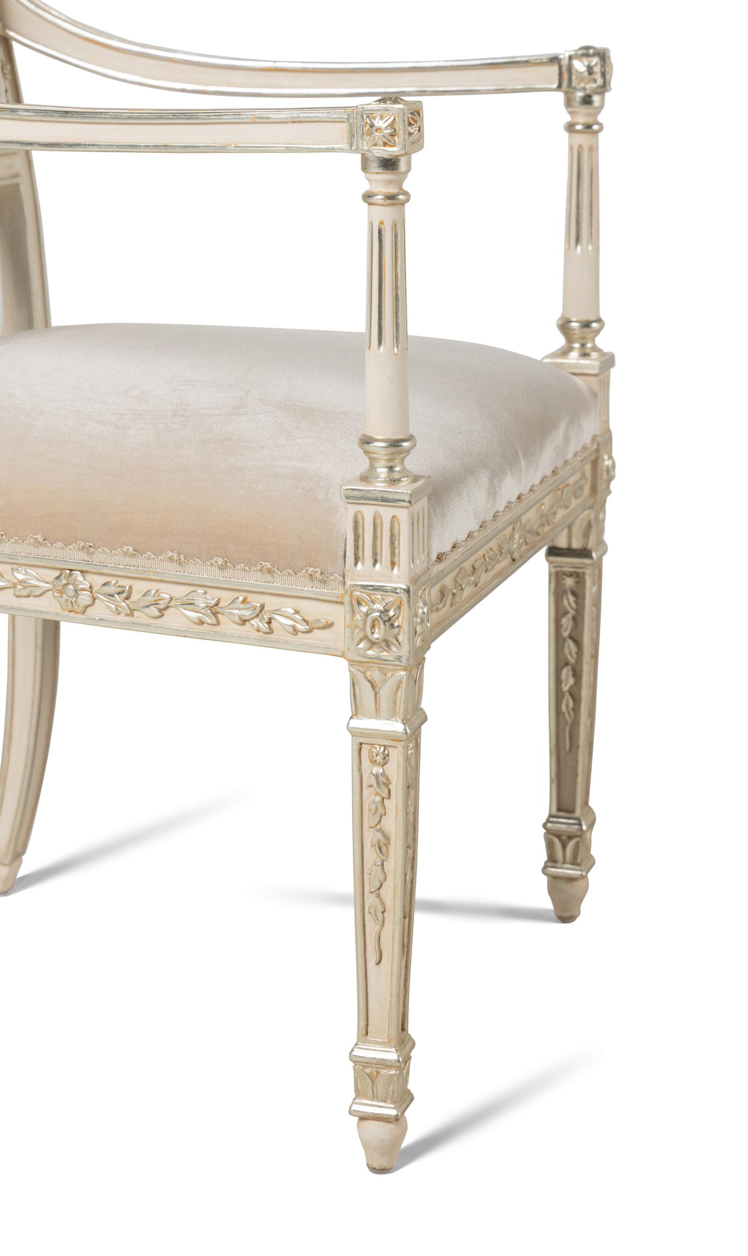 A Set of Ten Dennis and Leen Painted and Parcel Gilt Dining Chairs