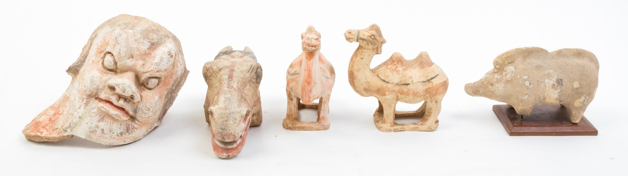 A Group of Tang Style Pottery Articles Height of first 6 1/2 inches.