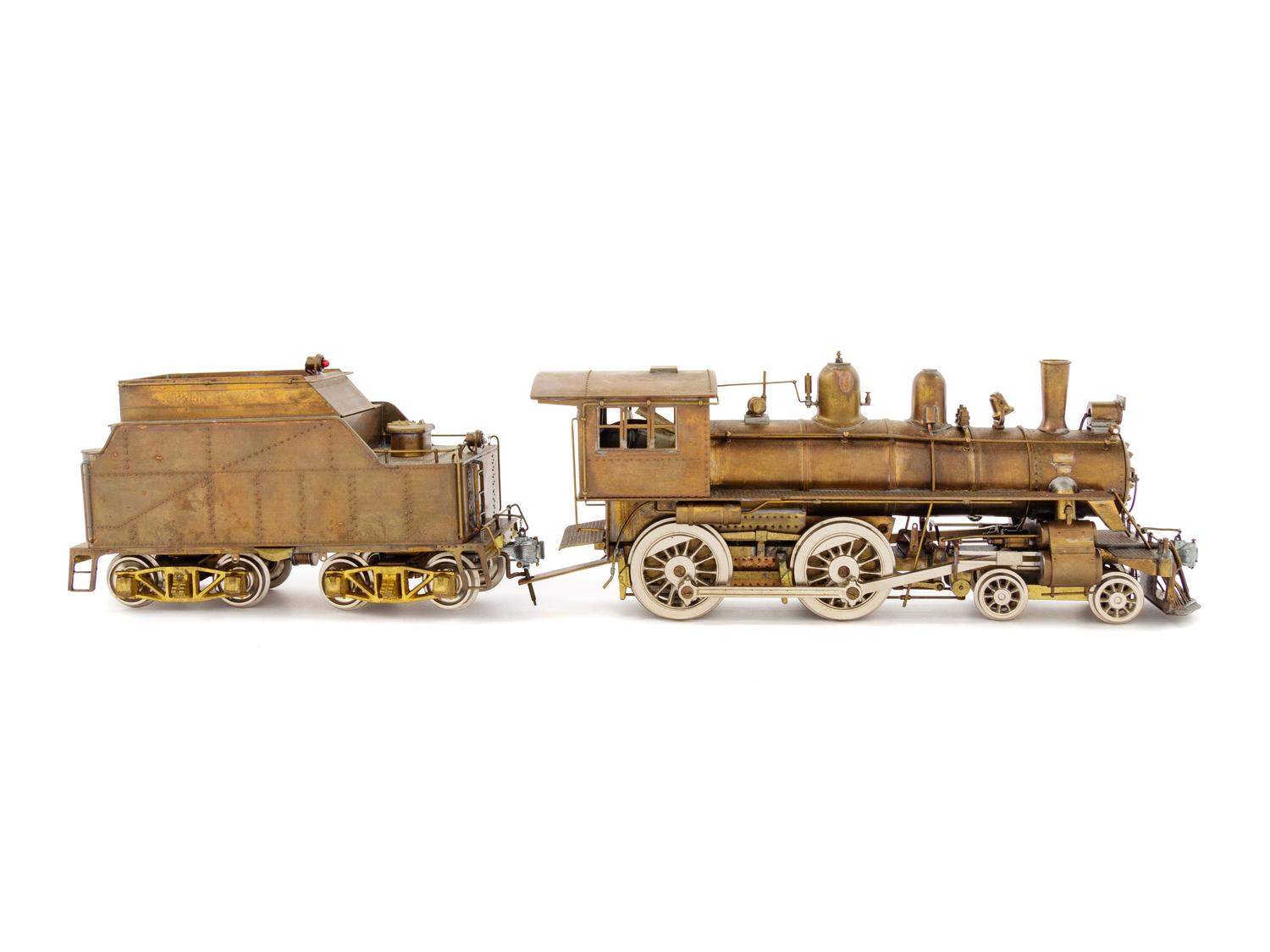 A Japanese Brass O-Gauge 4-4-0 Locomotive and Tender