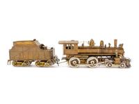 A Japanese Brass O-Gauge 4-4-0 Locomotive and Tender