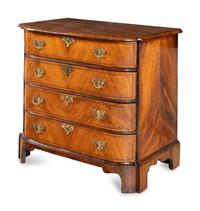 A George III Bookmatch-Veneered Bowfront Chest of Drawers