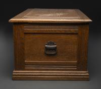 An Oak Three-Drawer Apothecary Cabinet with Specimen Tins
