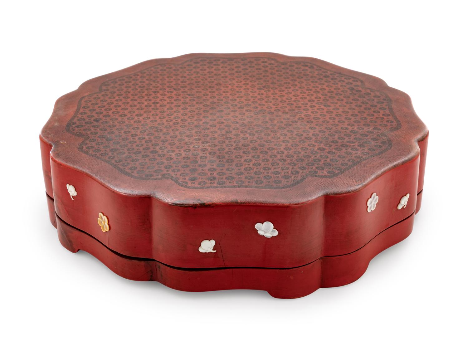 A Chinese Red Lacquered Octafoil Flori-Form Box