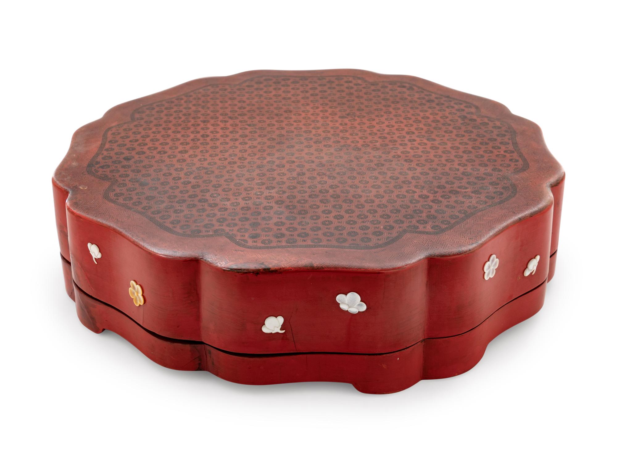 A Chinese Red Lacquered Octafoil Flori-Form Box