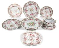 An English Ironstone Partial Dinner Service Diameter of first 10 1/4 inches.