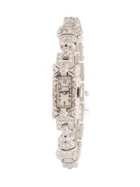 GENEVE, ART DECO, DIAMOND AND PLATINUM WATCH
