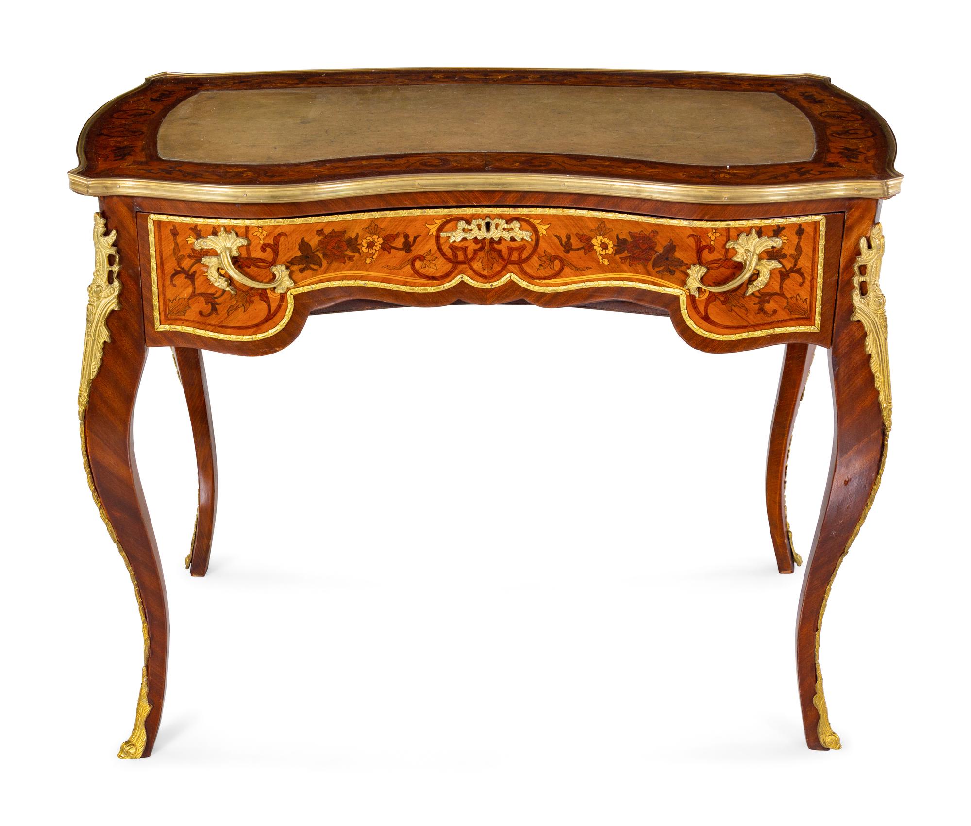 A Louis XV Style Gilt Bronze Mounted Marquetry Bureau Plat