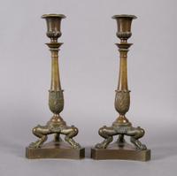 A Pair of Neoclassical Bronze Candlesticks, Height 11 3/8 inches.