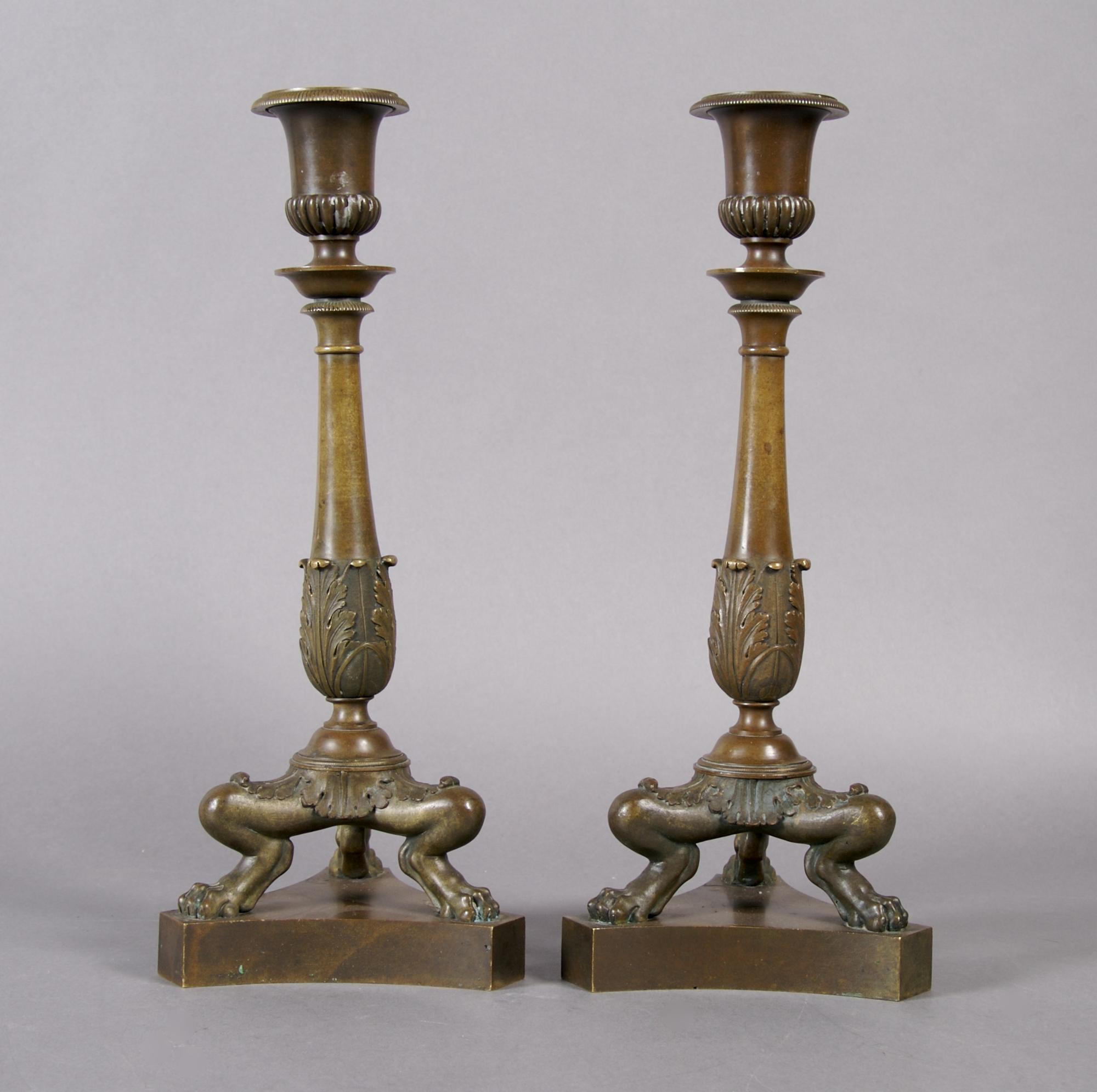 A Pair of Neoclassical Bronze Candlesticks, Height 11 3/8 inches.
