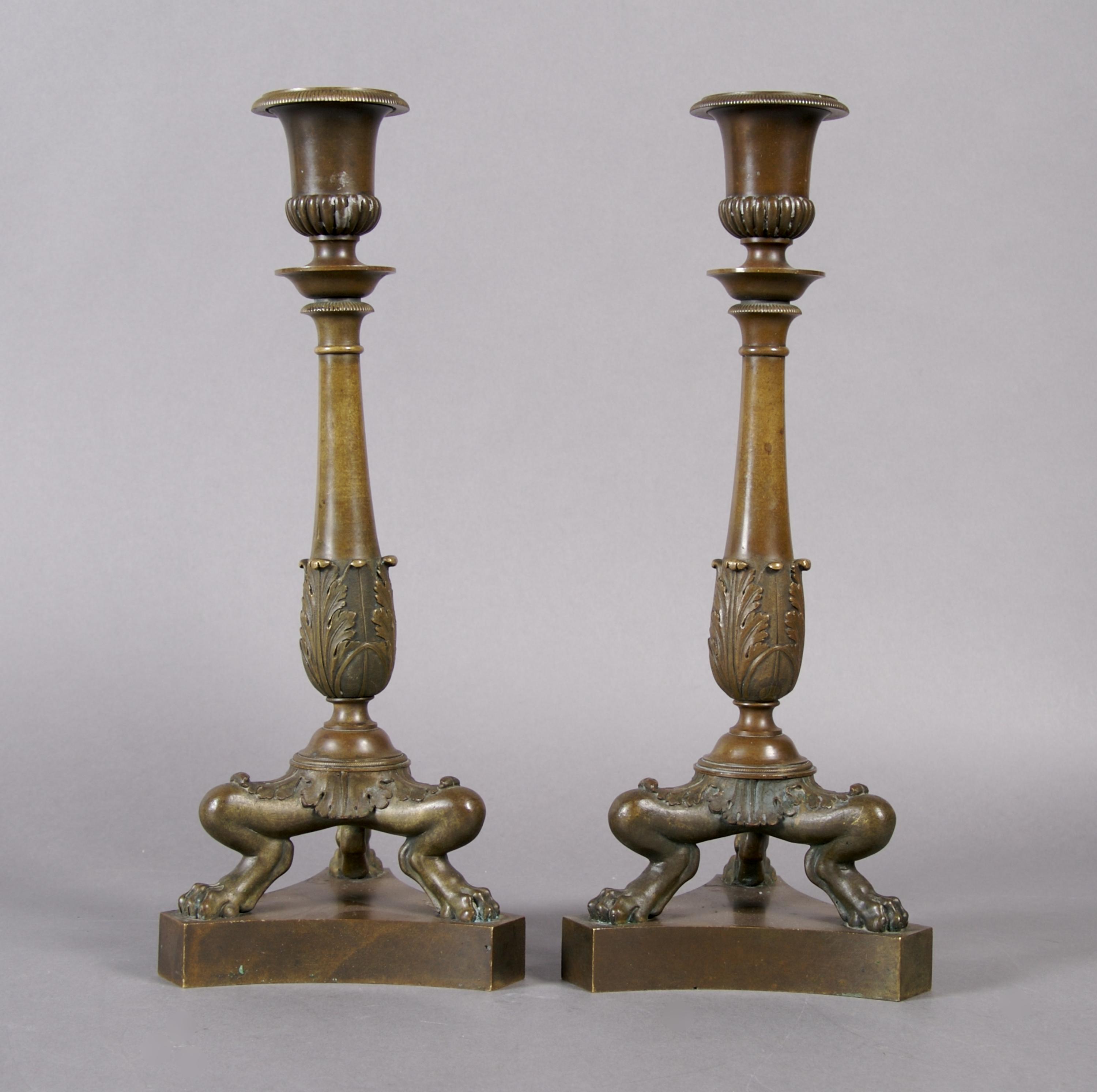 A Pair of Neoclassical Bronze Candlesticks, Height 11 3/8 inches.