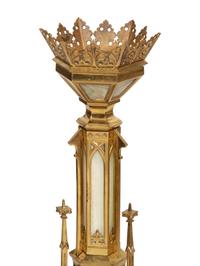 A Pair of Gothic Style Brass and Inset Glass Candlesticks