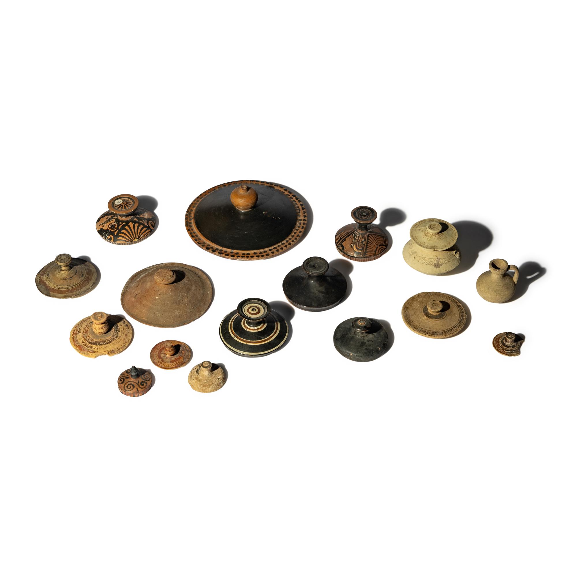 Fifteen Greco-Roman Terracotta Lids and Two Vessels