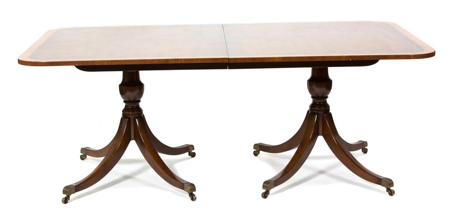 A Regency Style Mahogany Two-Pedestal Dining Table Height 29 1/2 x length 78 x depth 48 inches. — 20TH CENTURY