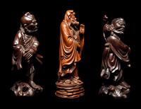 Seven Chinese Carved Hardwood Figures