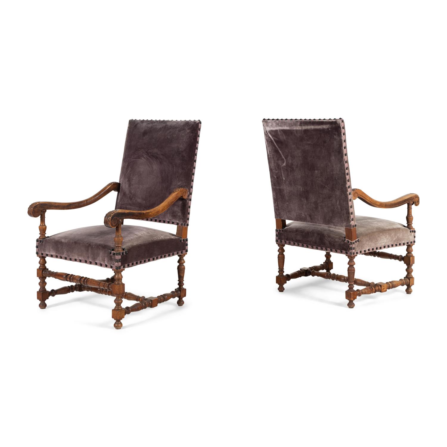 A Pair of Henry II Style Carved Fruitwood Fauteuils
