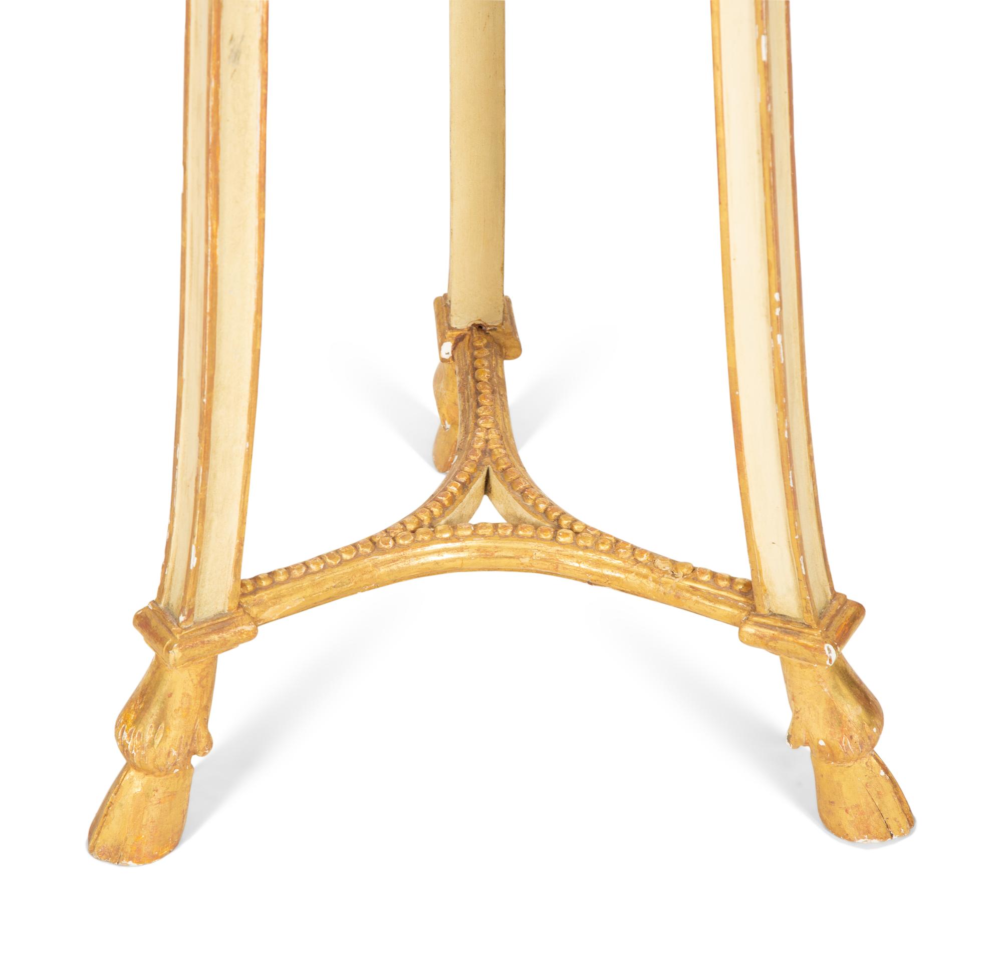 A George III Style Painted and Parcel Gilt Torchere Stand