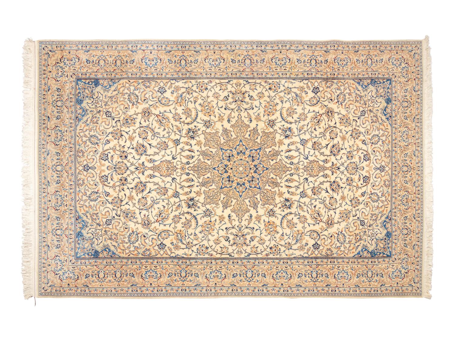 A Persian Silk and Wool Rug
