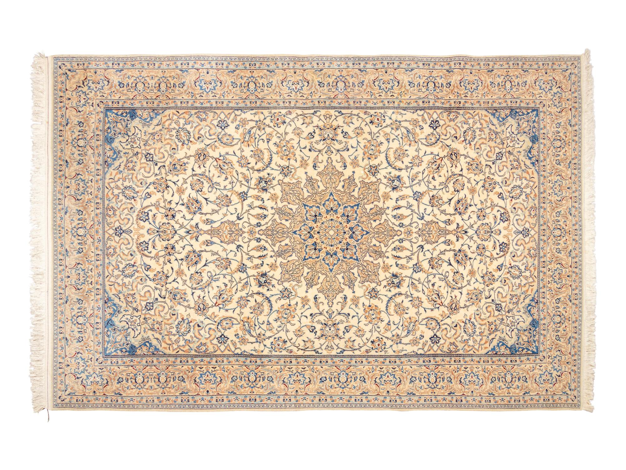 A Persian Silk and Wool Rug
