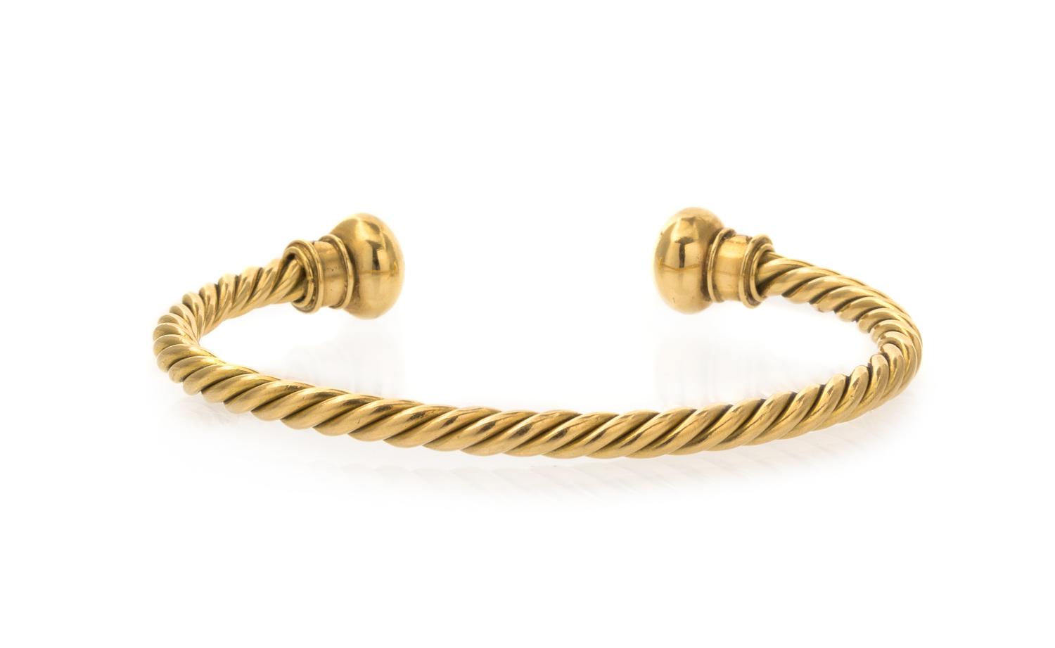 An 18 Karat Yellow Gold and Diamond Bangle Bracelet, Bulgari, 16.45 dwts.