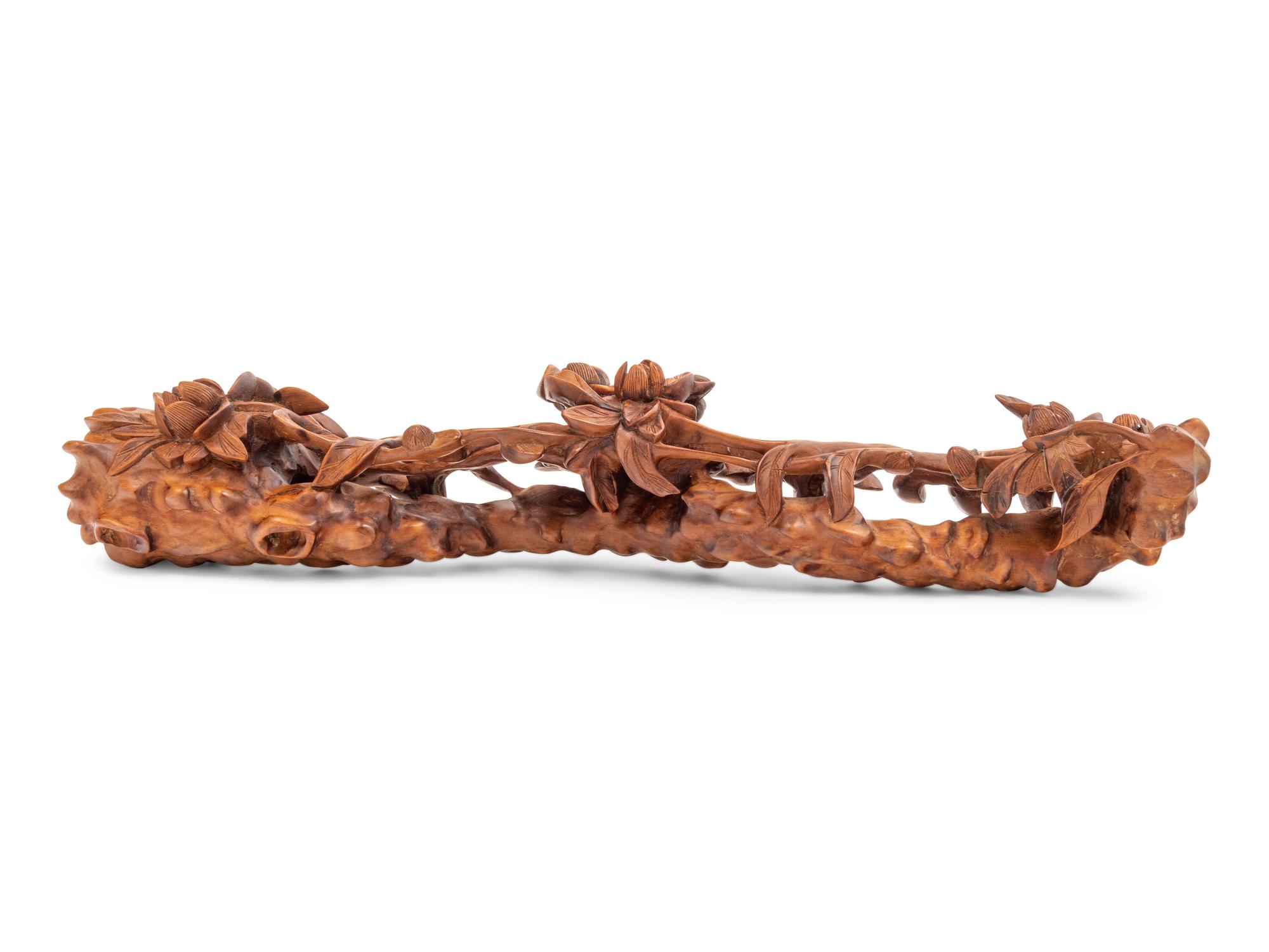 A Chinese Hardwood Carving of Peonies