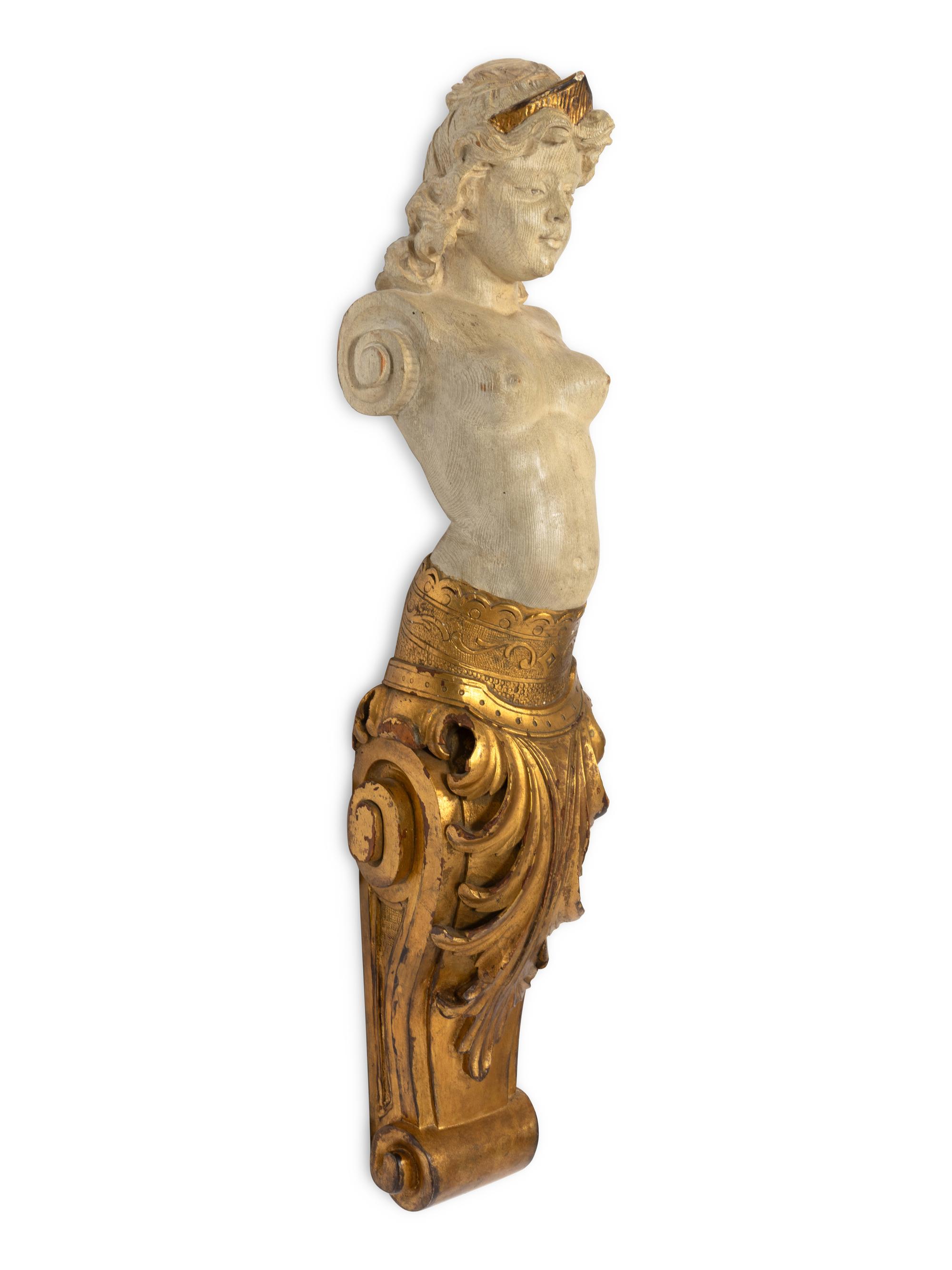 A Pair of Continental Carved Giltwood Caryatid Pilasters