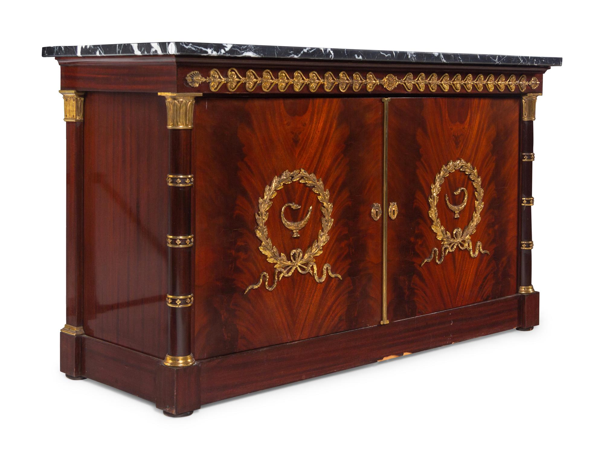 A Pair of Empire Style Gilt Bronze Mounted Mahogany Marble-Top Cabinets