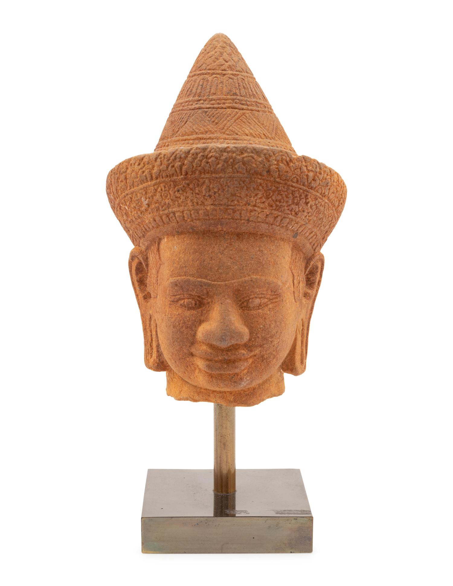 A Cambodian Sandstone Head of a Deity