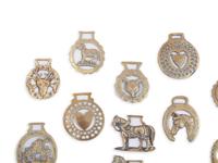 A Collection of Twenty Five Pressed and Cast Brass Buckles