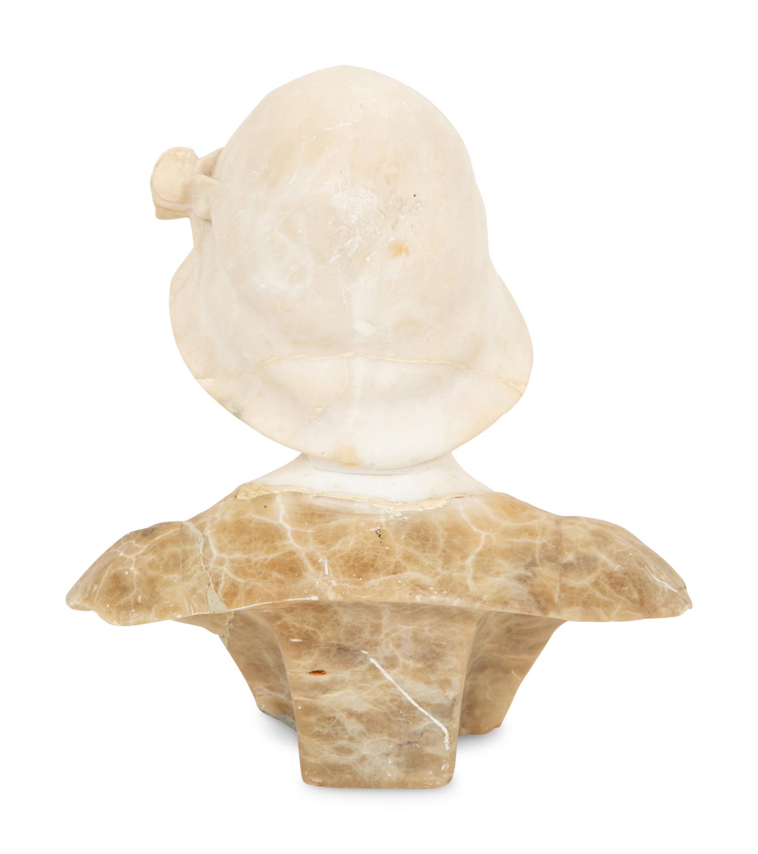 A Continental Carved Alabaster Bust of a Young Maiden