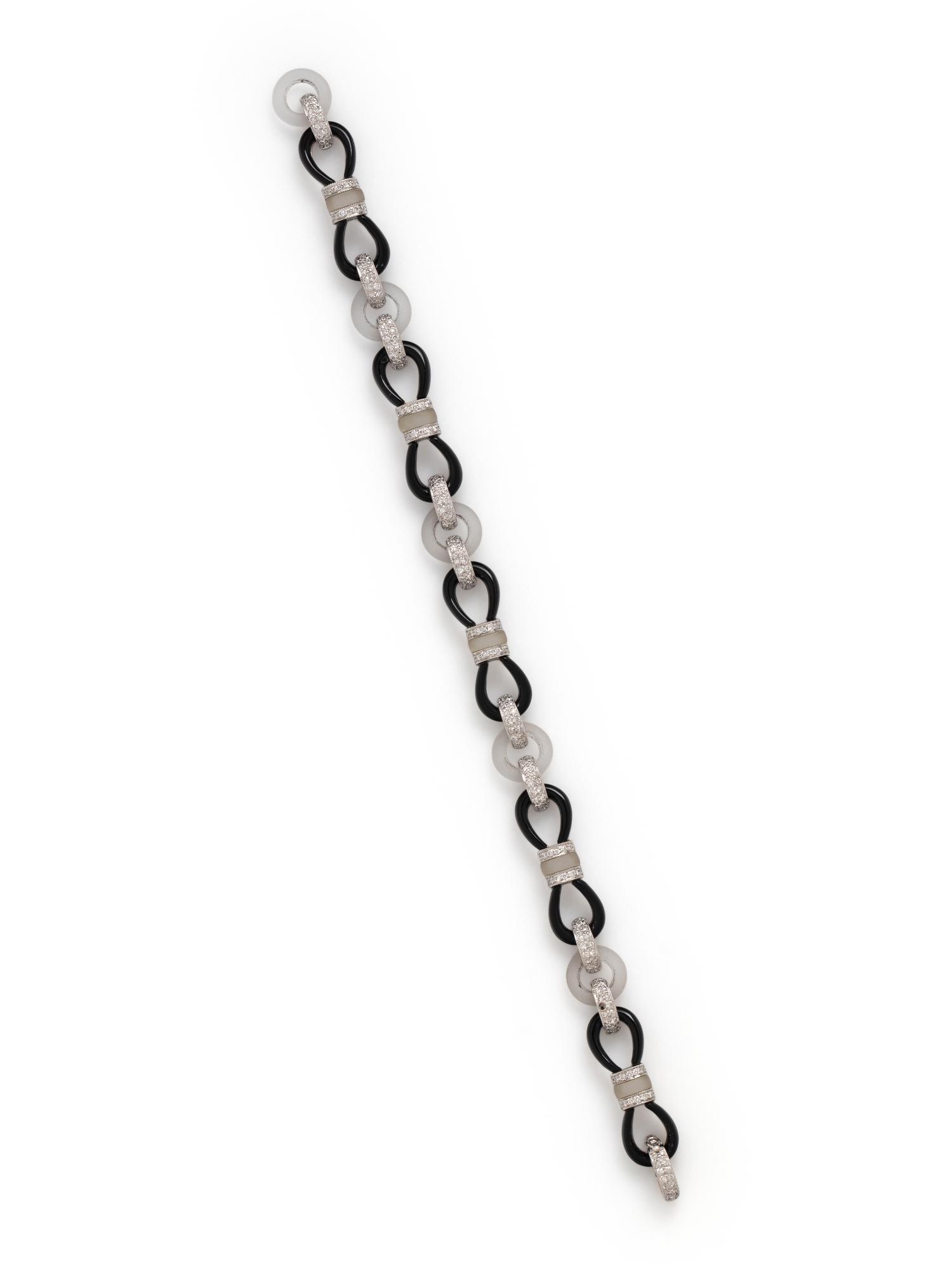 DIAMOND, ONYX AND ROCK CRYSTAL BRACELET