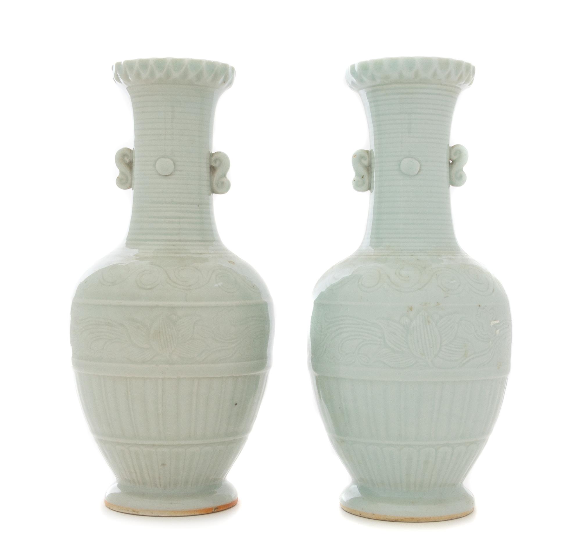 A Pair of Celadon Glazed Porcelain Vases Height of each 9 3/8 inches.