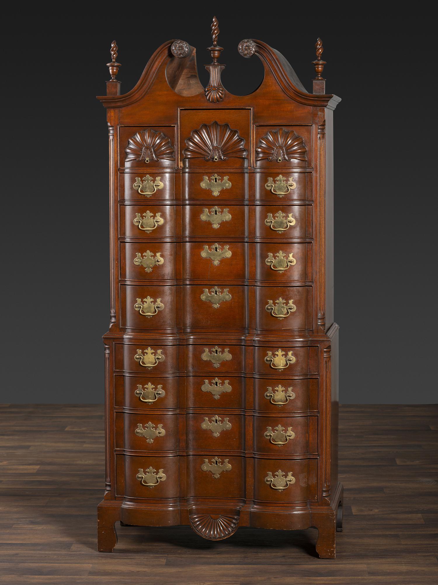 A Chippendale Style Shell and Rosette Carved Mahogany Block Front Chest-On-Chest