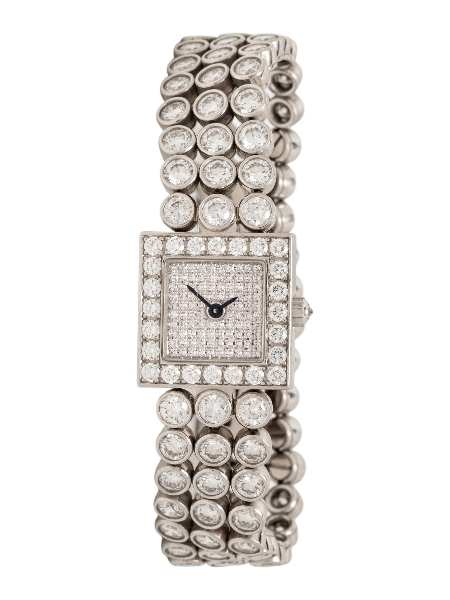 HARRY WINSTON, DIAMOND AND PLATINUM 'SIGNATURE' WATCH