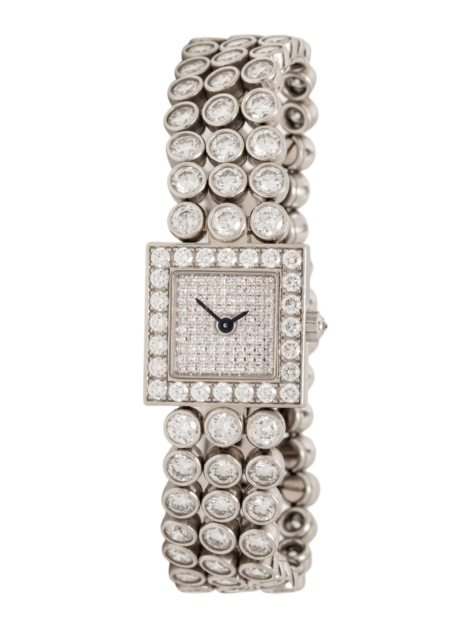 HARRY WINSTON, DIAMOND AND PLATINUM 'SIGNATURE' WATCH