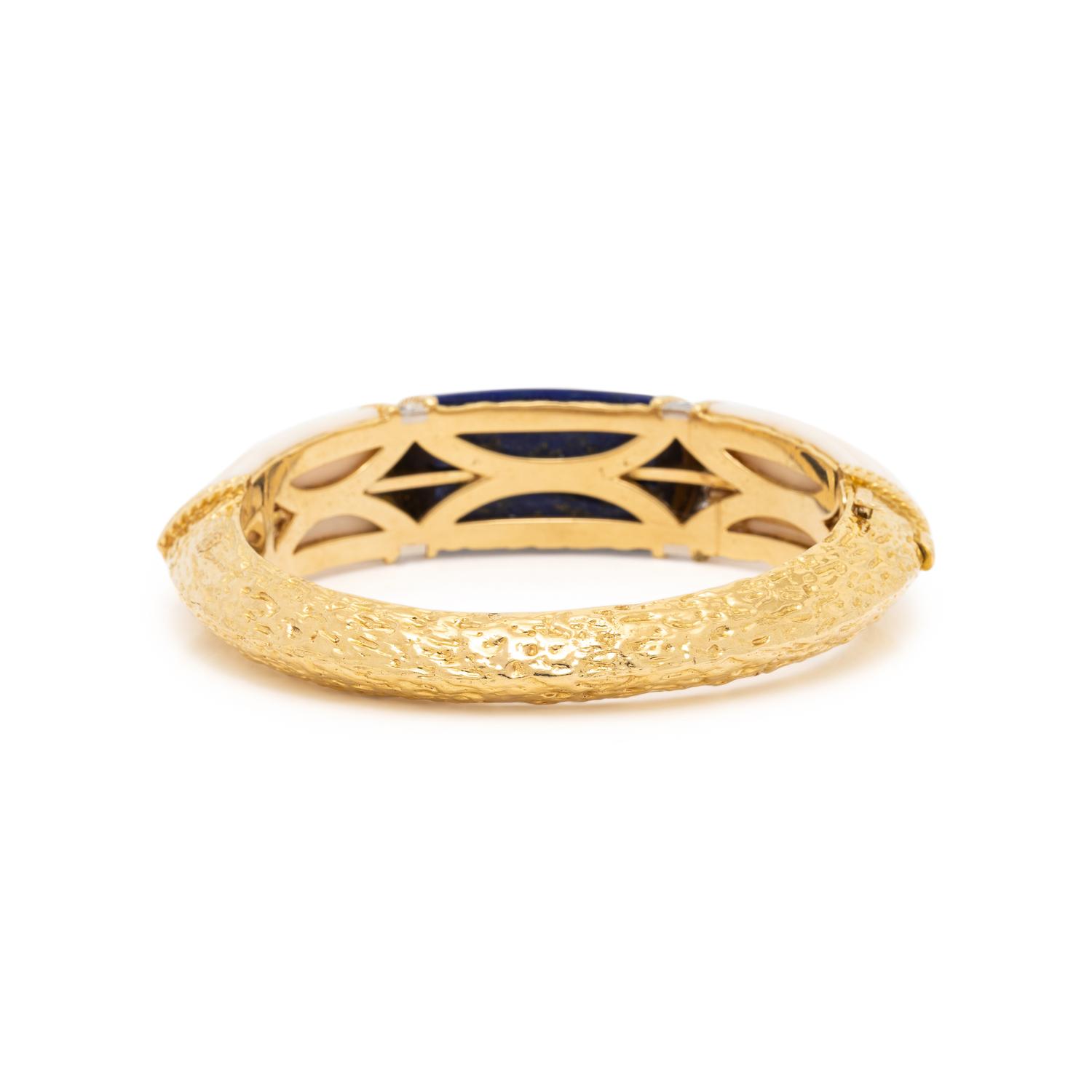 FRENCH, LAPIS LAZULI, ANGELSKIN CORAL, DIAMOND, AND YELLOW GOLD BANGLE BRACELET