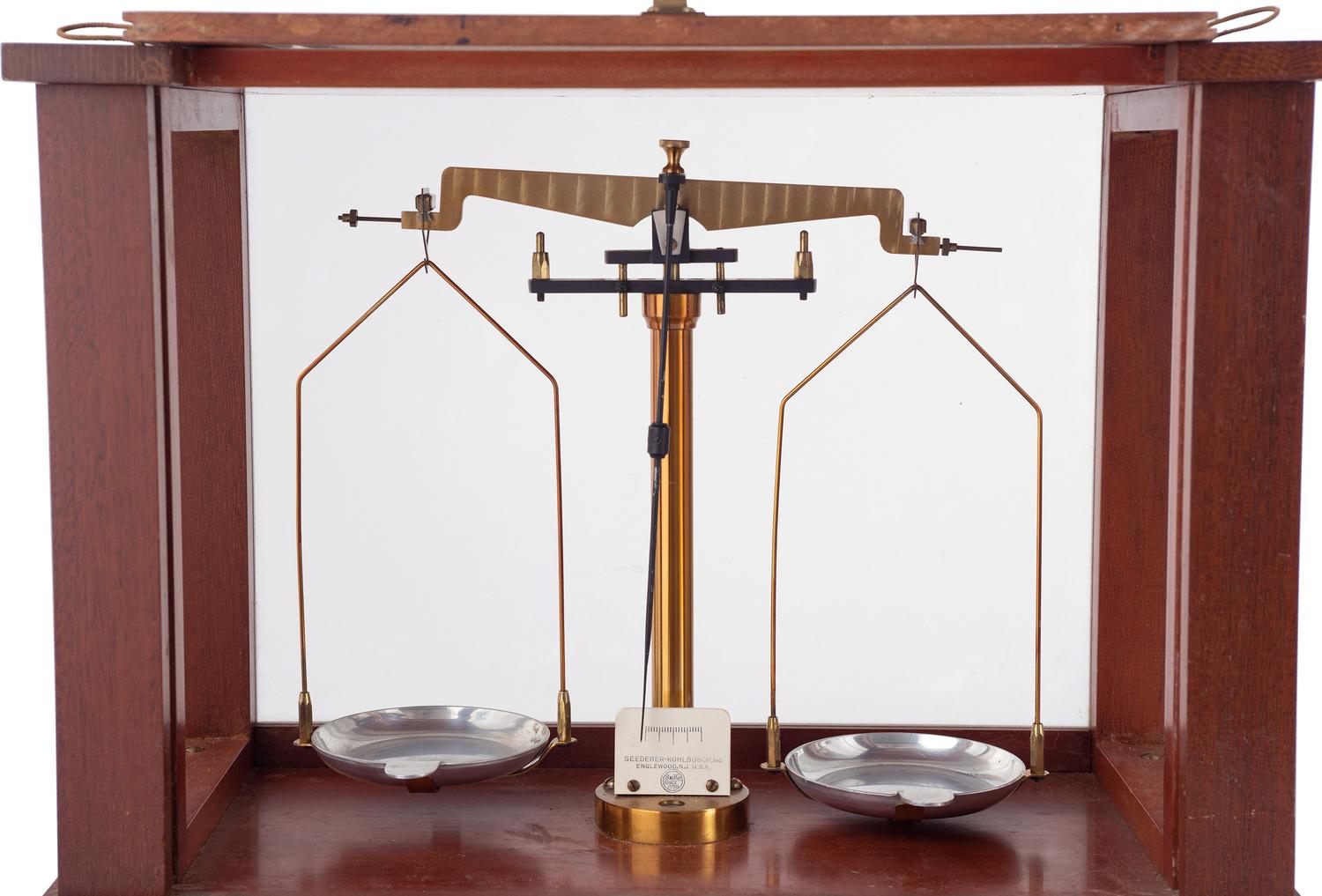 A Central Scientific Co. Scale, an Ingraham Eight-Day Movement Mantle Clock and Framed Salesmen Samples of Blue Grass Axes