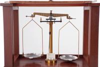 A Central Scientific Co. Scale, an Ingraham Eight-Day Movement Mantle Clock and Framed Salesmen Samples of Blue Grass Axes