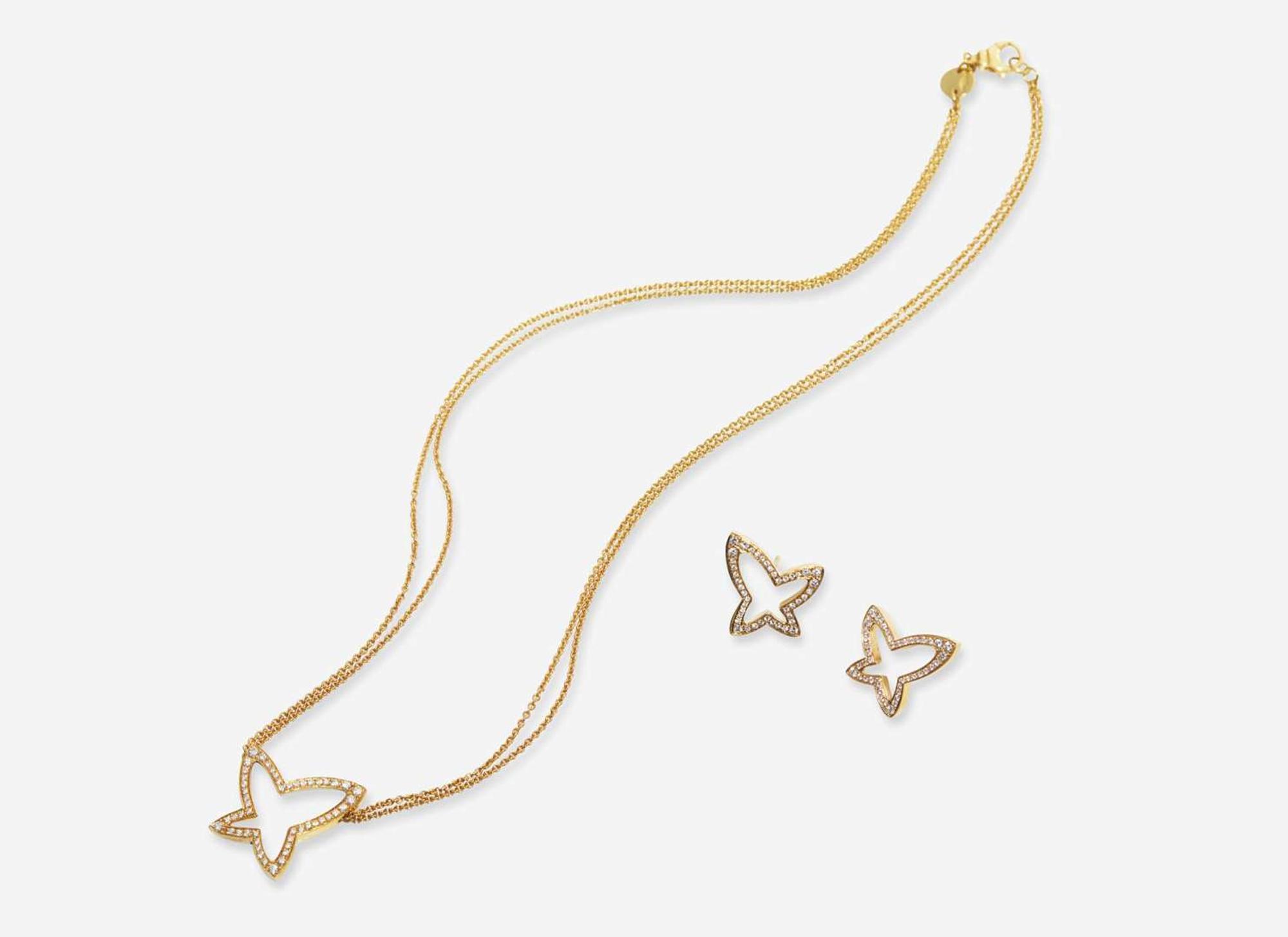 An 18K Yellow Gold Earrings and Necklace Set by Movado