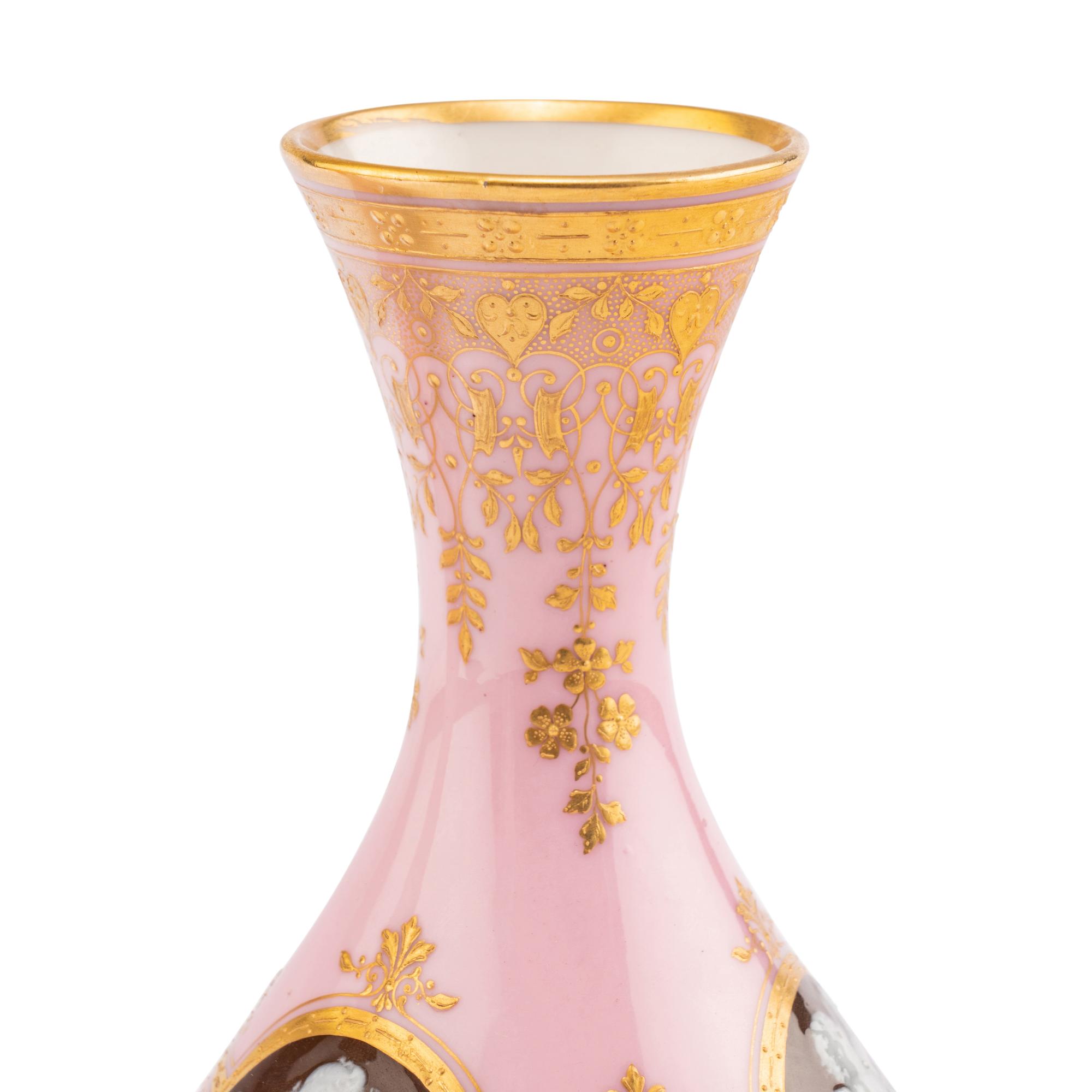 A Pair of Minton Pâte-sur-Pâte Pink Ground Bottle Vases
