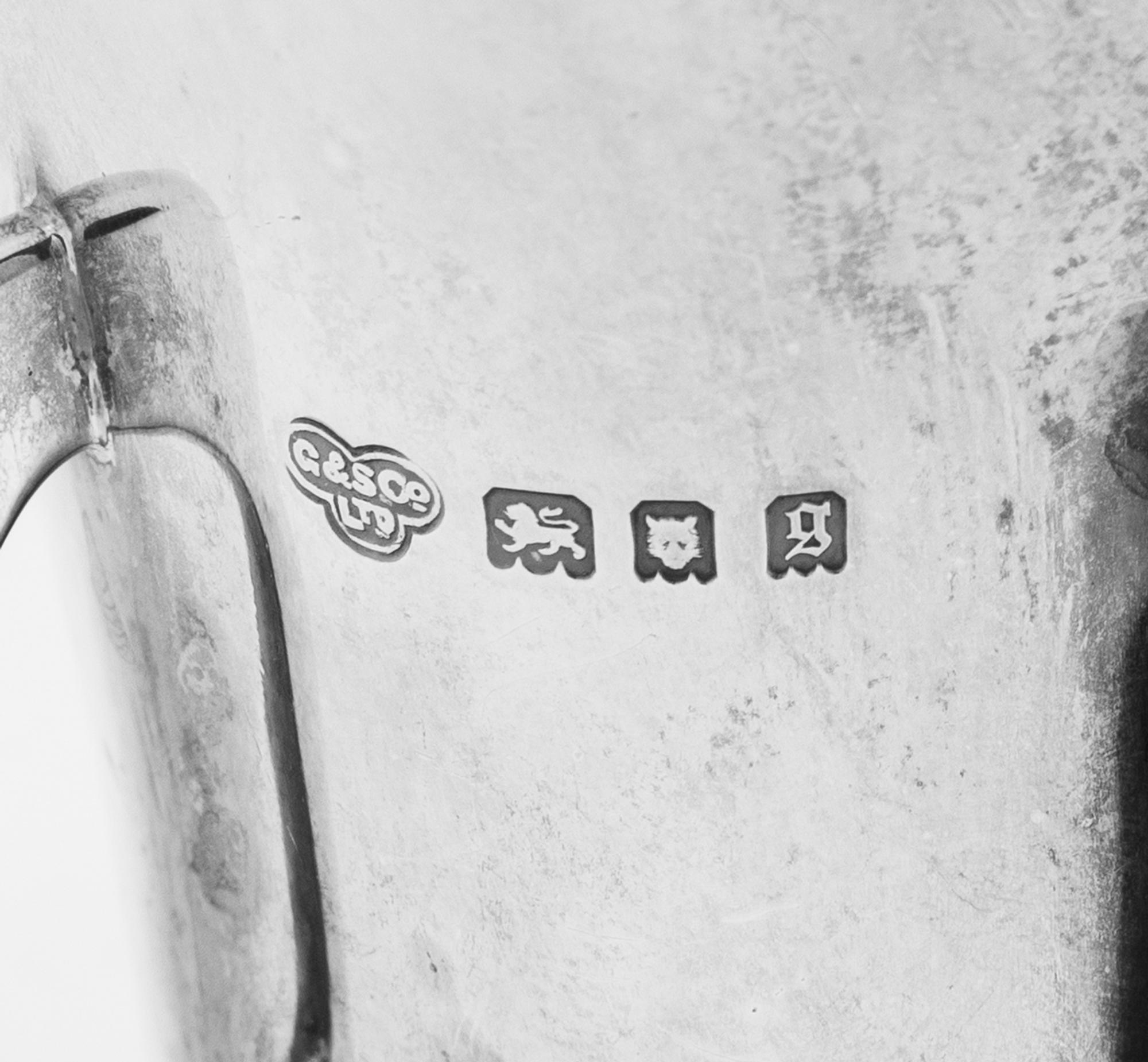 A Collection of Eight English Silver Miniature and Diminutive Articles