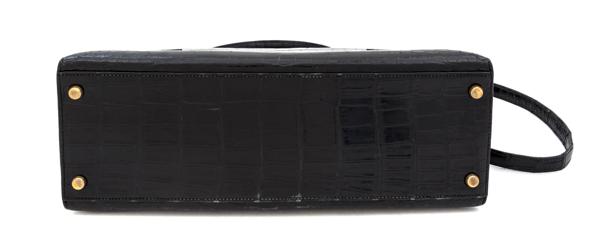 An Hermes 32cm Black Porosus Crocodile Kelly Bag, 12" x 9.5" x 4.5".