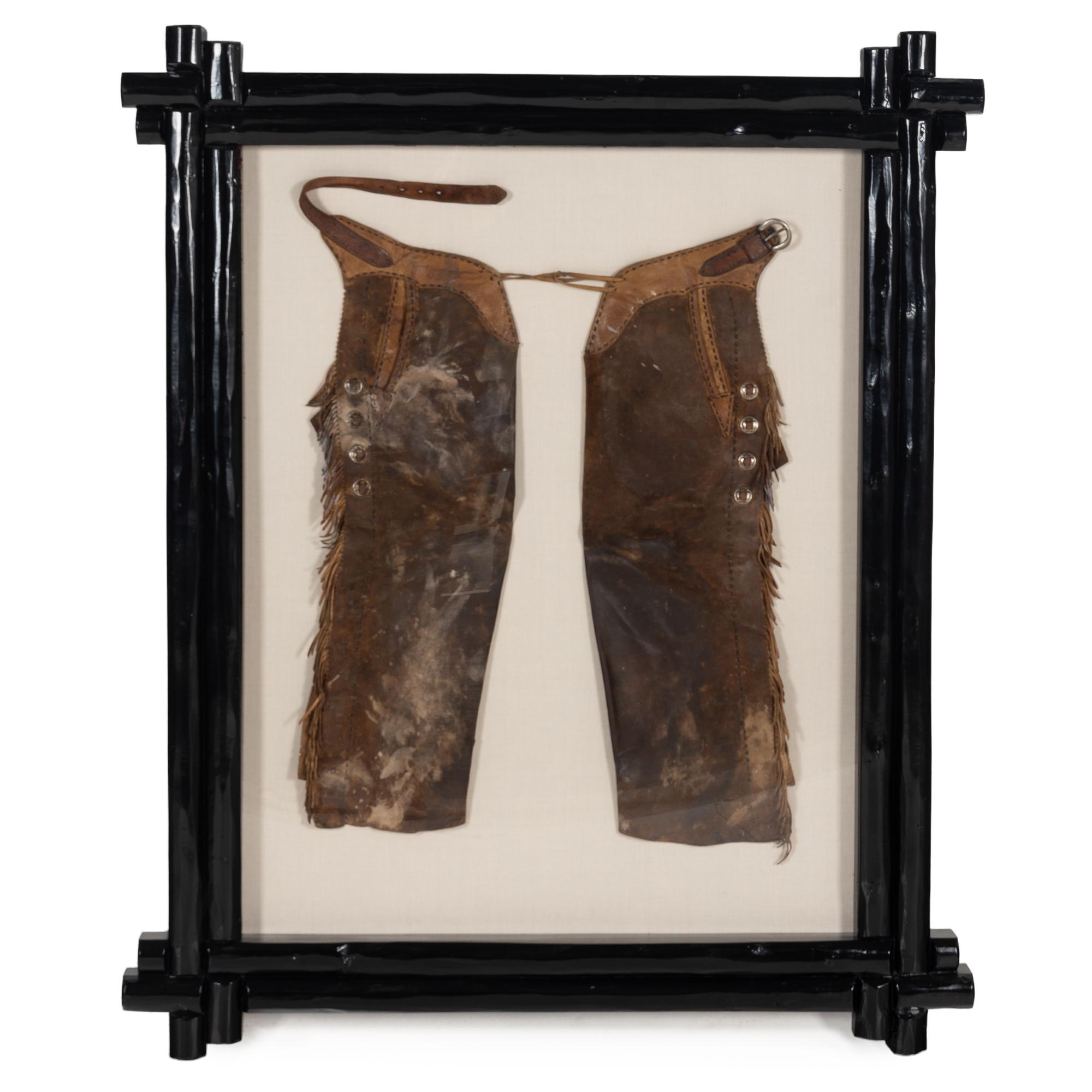 Two Pairs of Joseph Heinrich Framed Cowboy Chaps