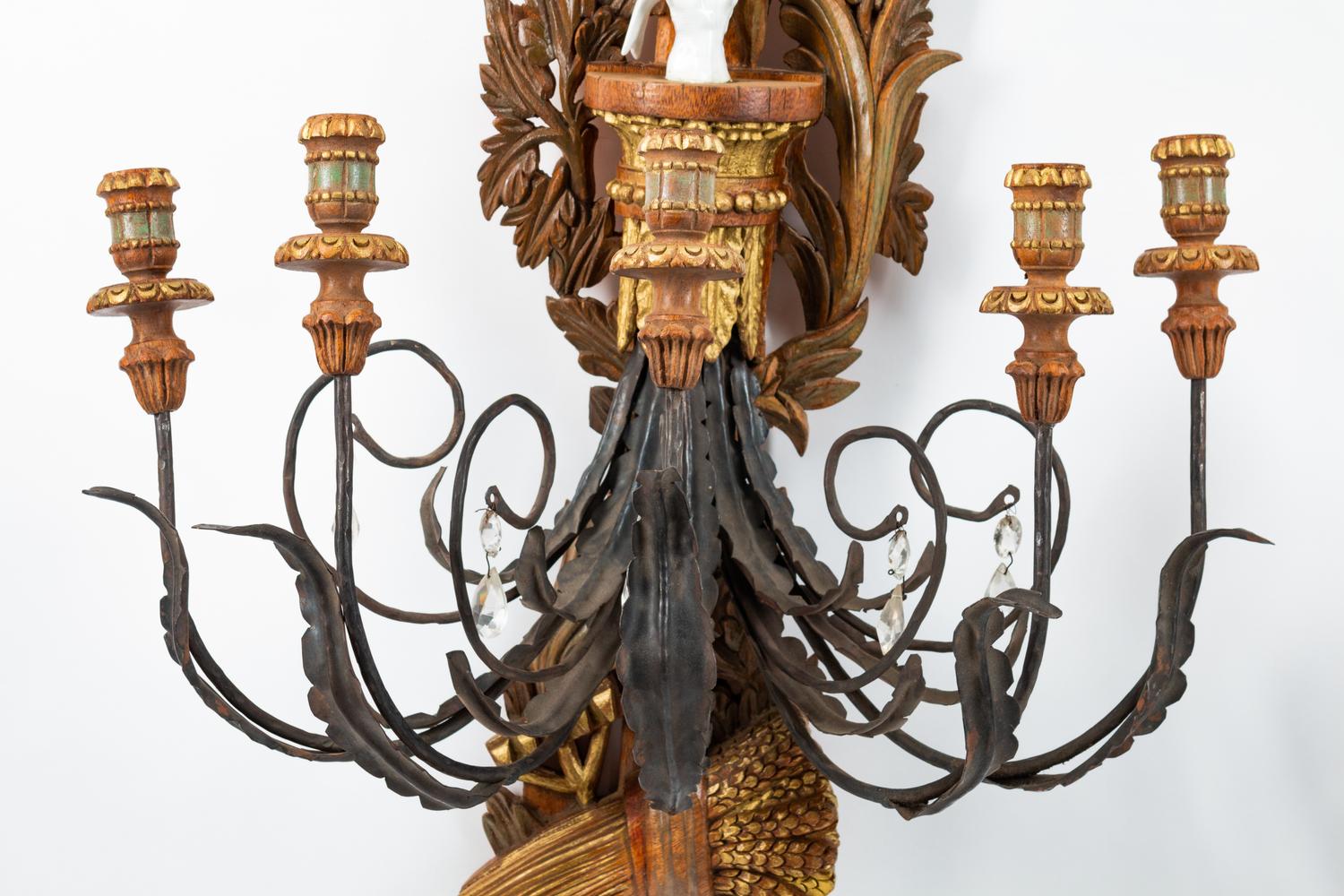 A Pair of Spanish Neoclassical Style Carved Wood, Wrought-Iron and Tole Five-Light Sconces