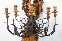 A Pair of Spanish Neoclassical Style Carved Wood, Wrought-Iron and Tole Five-Light Sconces