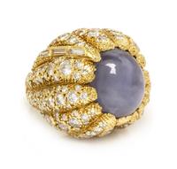 A Yellow Gold, Star Sapphire and Diamond Bombe Ring, 30.40 dwts.