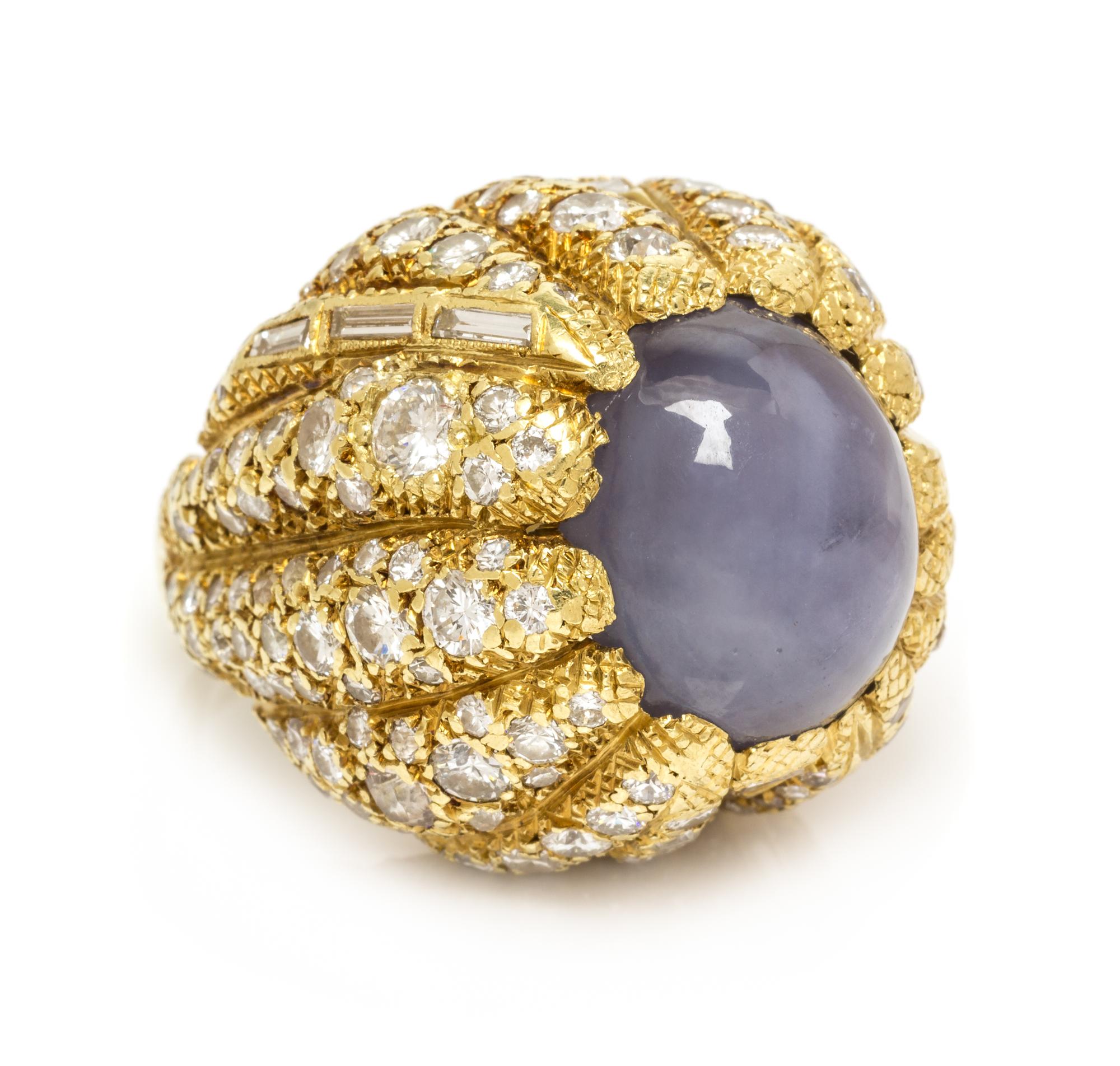 A Yellow Gold, Star Sapphire and Diamond Bombe Ring, 30.40 dwts.